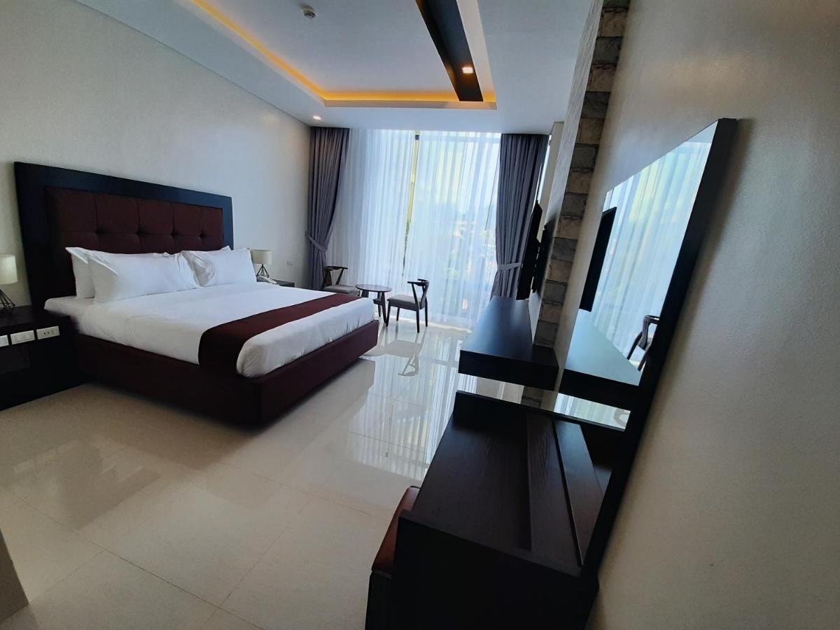 Winrich Hotel Мактан Экстерьер фото