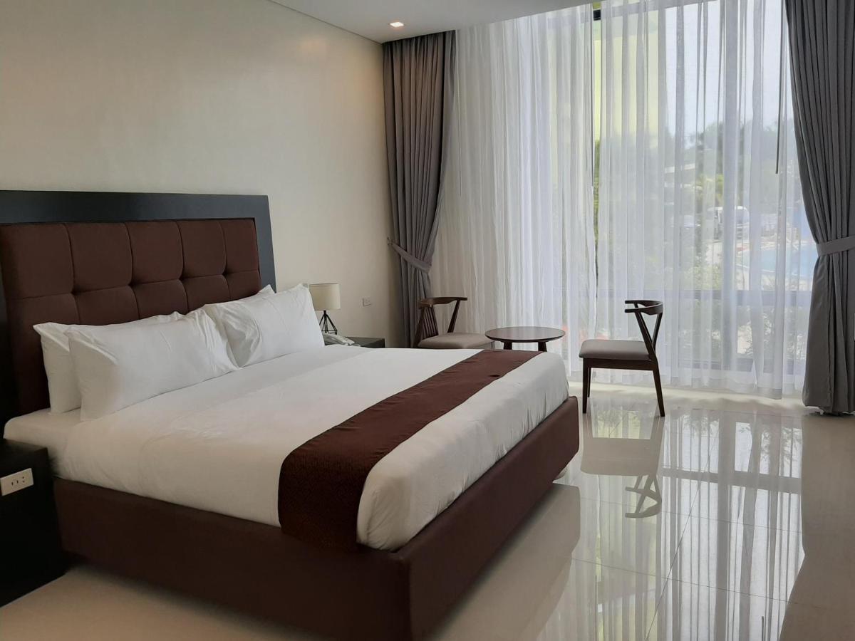 Winrich Hotel Мактан Экстерьер фото