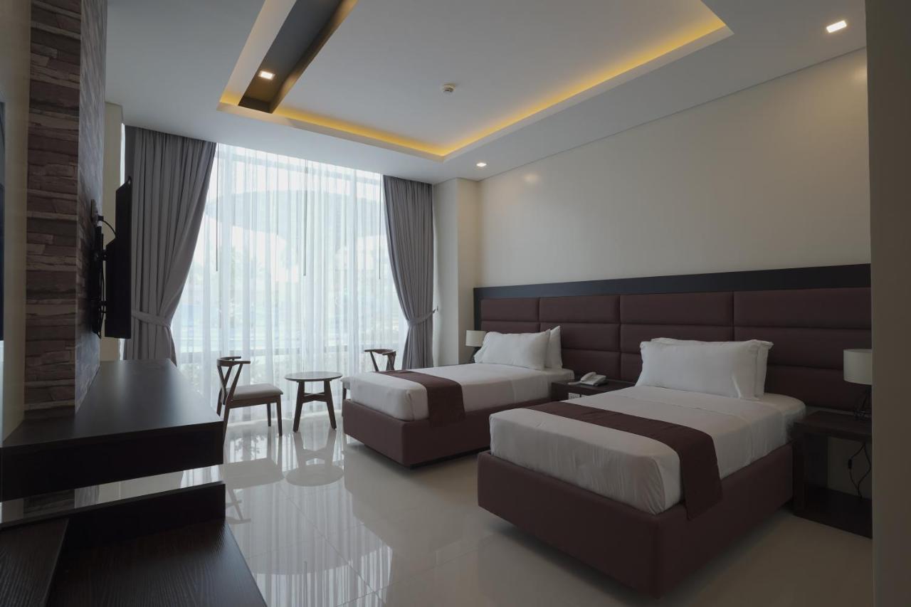 Winrich Hotel Мактан Экстерьер фото