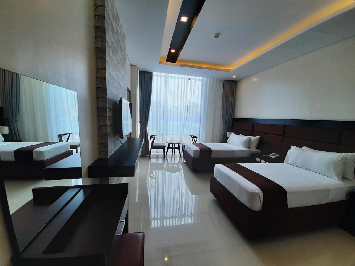 Winrich Hotel Мактан Экстерьер фото