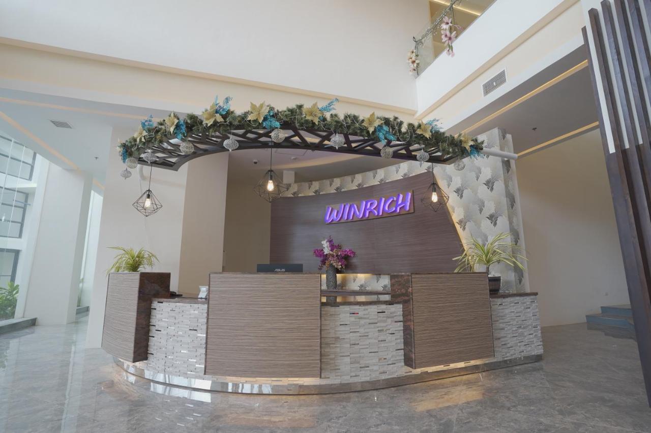 Winrich Hotel Мактан Экстерьер фото