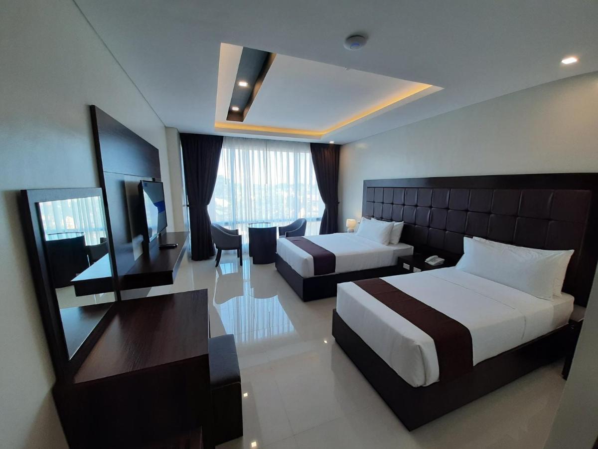 Winrich Hotel Мактан Экстерьер фото